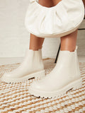 Faux Leather Lug Sole Chelsea Booties