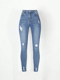 Teen Girl Ripped Frayed Cat Whisker Jeans