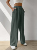 Regular Trousers With Elastic Waist And Slant Pockets