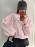 Bow-Patterned Drop Shoulder Sleeve Sweatshirt