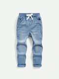 Young Boy Light Blue Washed Denim Jeans With Bowknot Belt