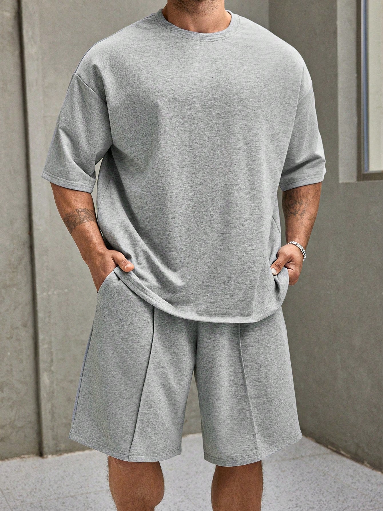 Men's Plus Size Solid Color Drop Shoulder T-Shirt And Slanted Pocket Shorts Set