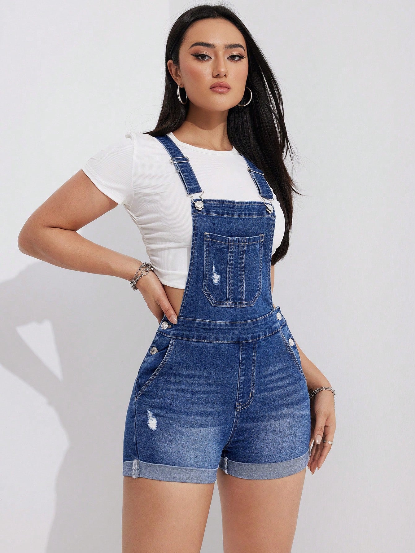 Washed And Distressed Denim Dungarees With Pockets