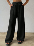 Loose Wide-Leg Pants With Textured Wrinkled Fabric And Drawstring Waist