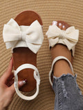 Women's British Style Beige Bowknot New Fashion Simple Flat Round-Toe Sandals