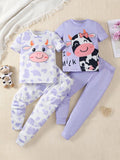 Young Girl Snug Fit 2 Sets Combo Of Simple Cow Printed Short Sleeve Top And Long Pants For Home Wear